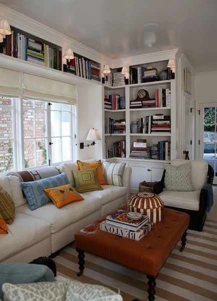 white walls bookcases around window white walls bookcases around window