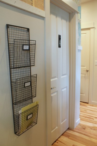 organizing with a wire basket in hall organizing with a wire basket in hall