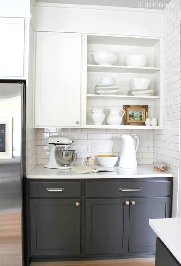 Kitchen baking area with open cabinets and two tone gray and white cabinets