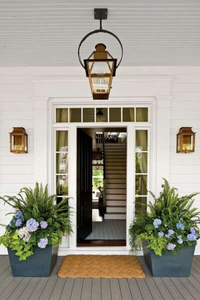 White Farmhouse Exterior - Copper Outdoor Lanterns and Sconces - Southern Living Idea House 2012 - Historical Concepts