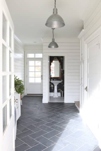 Mudroom Design - White Walls and Gray Tile Floor - Studio McGee