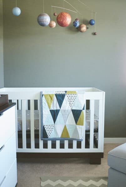 Nursery tour with planet mobile and triangle quilt