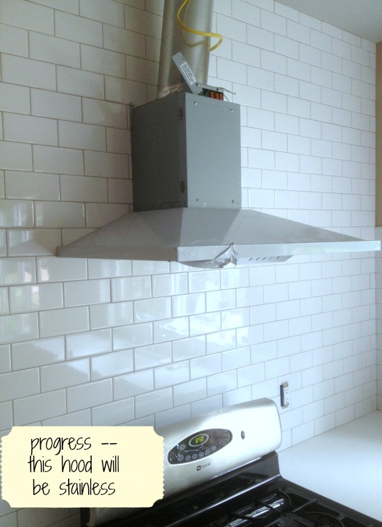 white subway tile grey grout bathroom