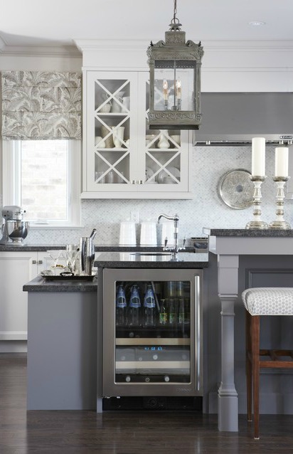 Kitchen with white cabinets store and gray walls