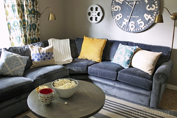 Creating Ambience {New Wall Sconces in the Media Room}