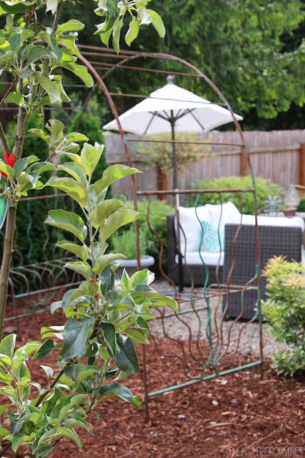 My Backyard Tour {Pea Gravel Patios, Flagstone & Secret Garden}