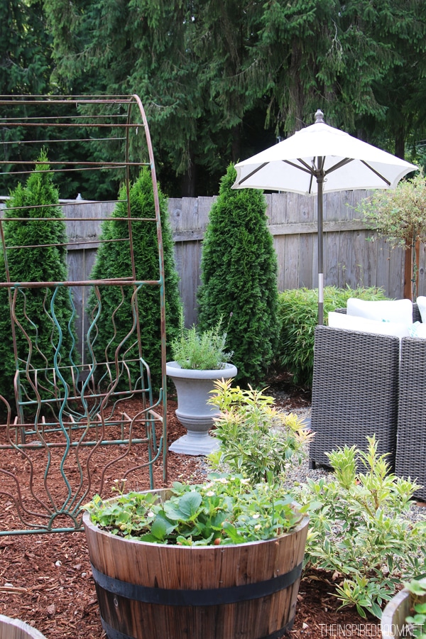 My Backyard Tour {Pea Gravel Patios, Flagstone & Secret Garden}