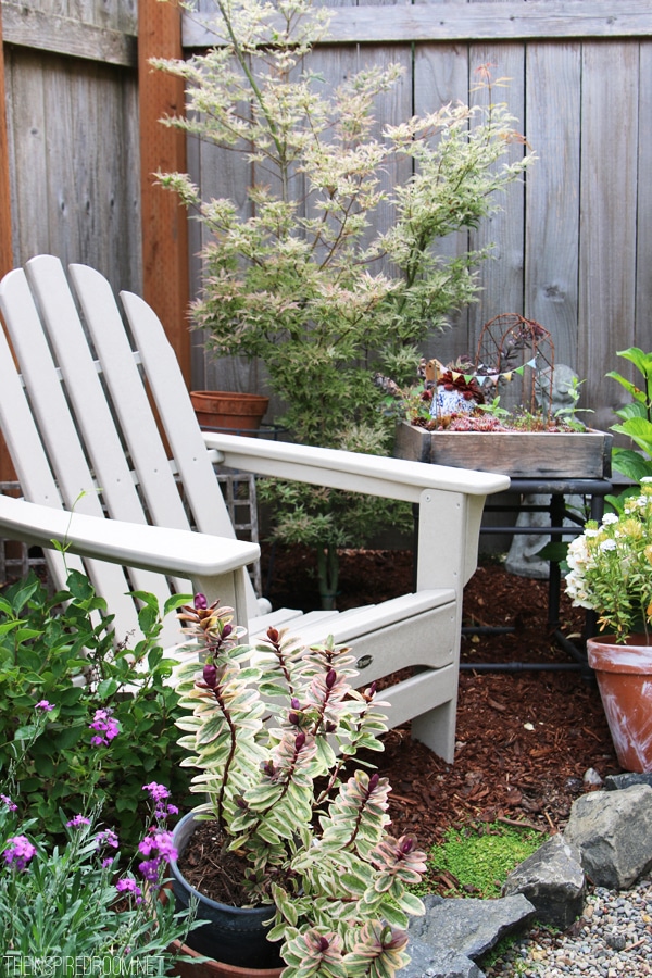 My Backyard Tour {Pea Gravel Patios, Flagstone & Secret Garden}