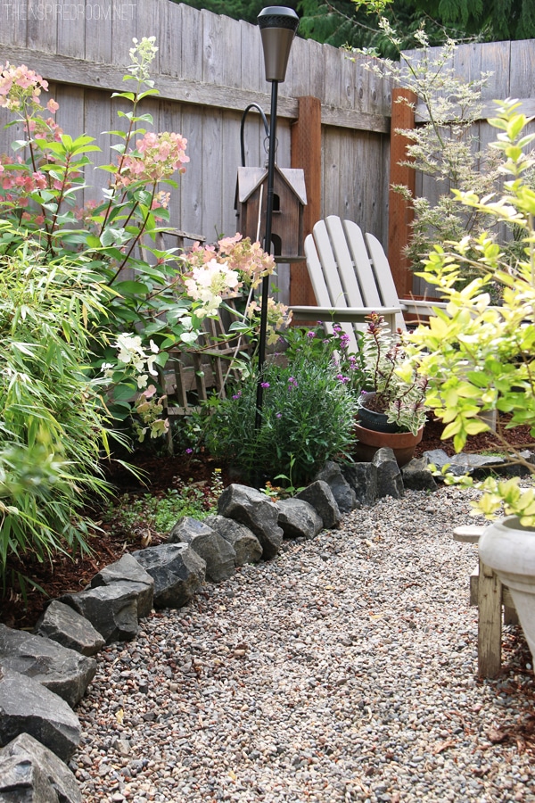 My Backyard Tour {Pea Gravel Patios, Flagstone & Secret Garden}