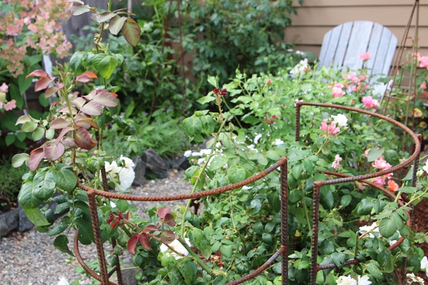 My Backyard Tour {Pea Gravel Patios, Flagstone & Secret Garden}