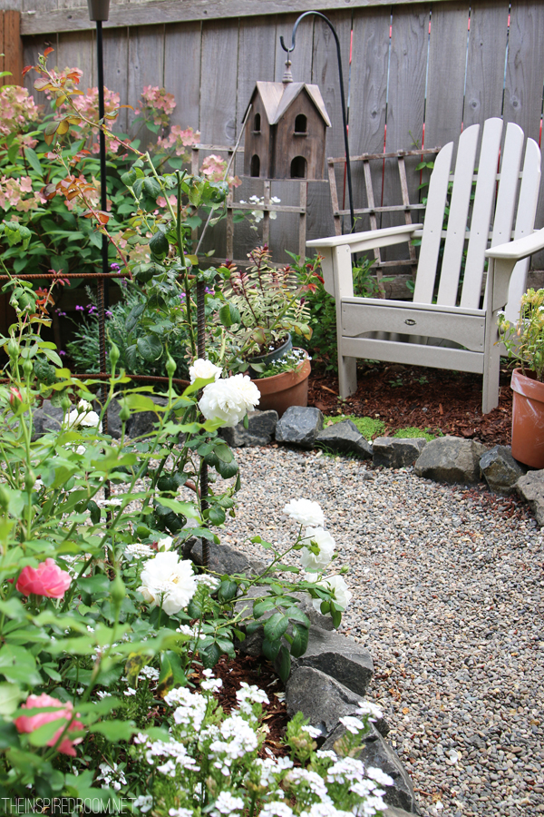 My Backyard Tour {Pea Gravel Patios, Flagstone & Secret Garden}