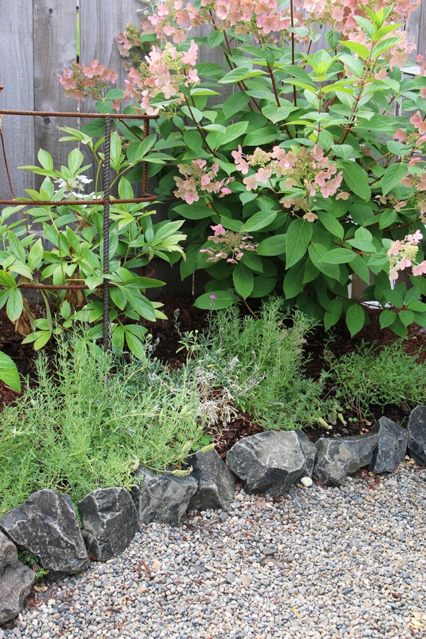 My Backyard Tour {Pea Gravel Patios, Flagstone & Secret Garden}