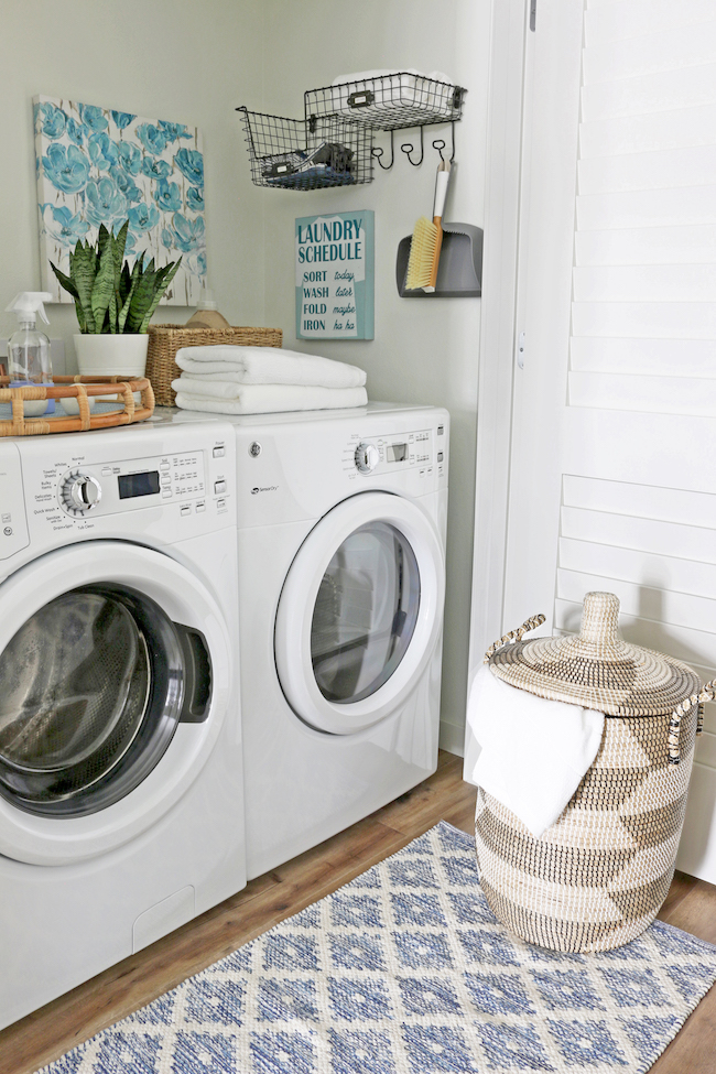 A Cute Organized Laundry Room In A Closet The