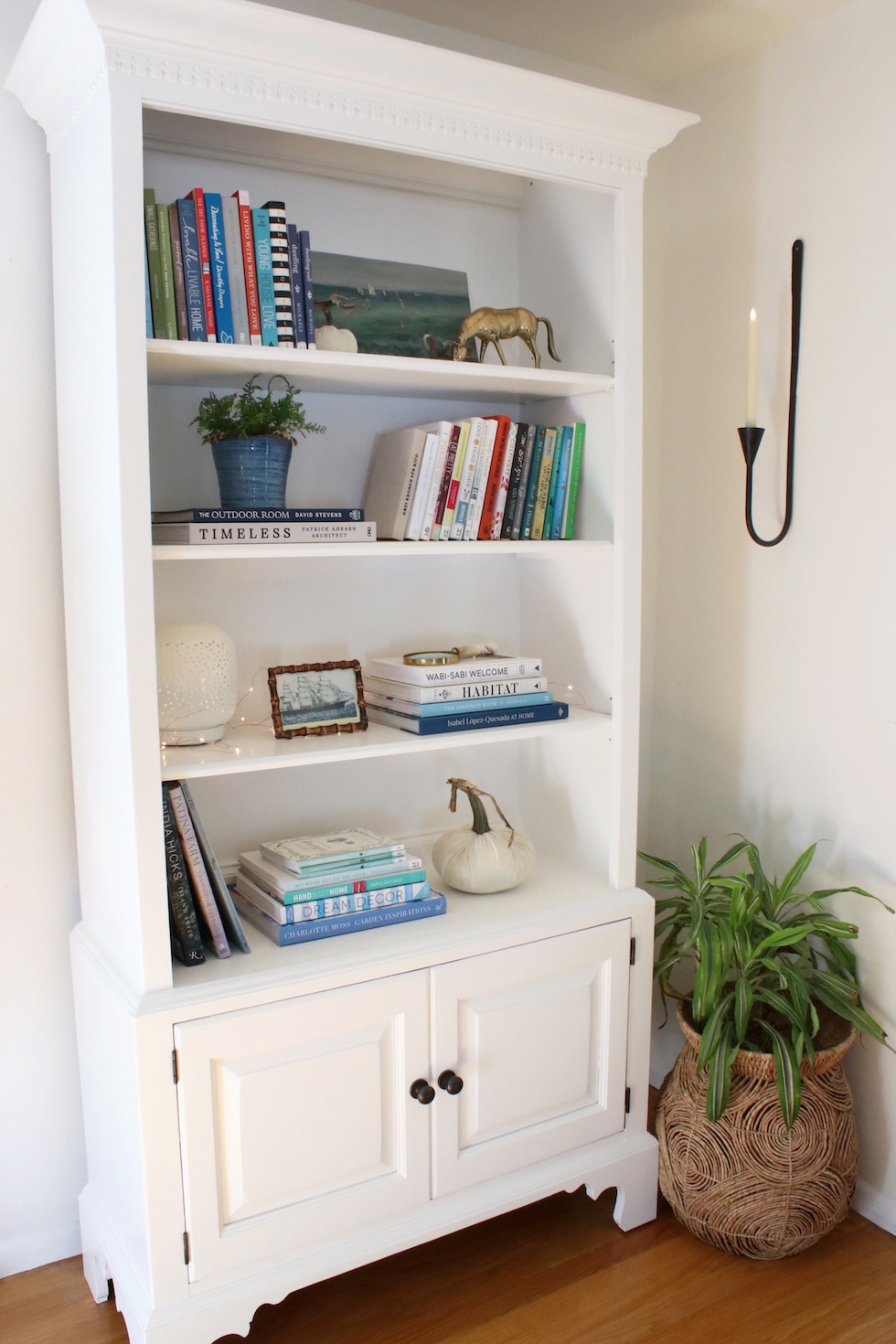 White bookshelf with 2024 wood shelves