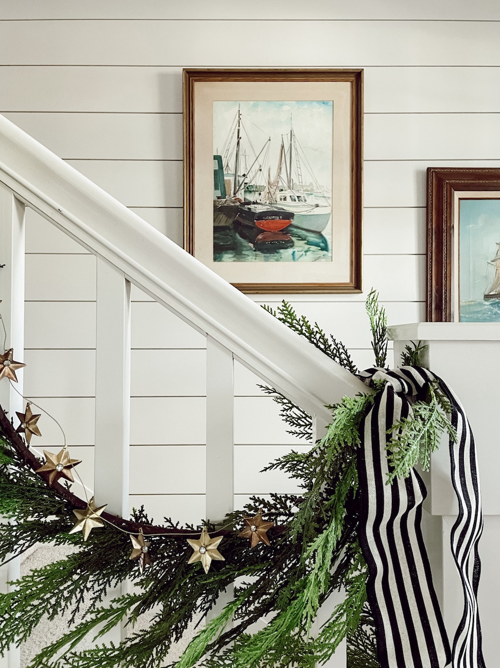 Simple Festivity: Whimsical Cedar Garland on the Staircase