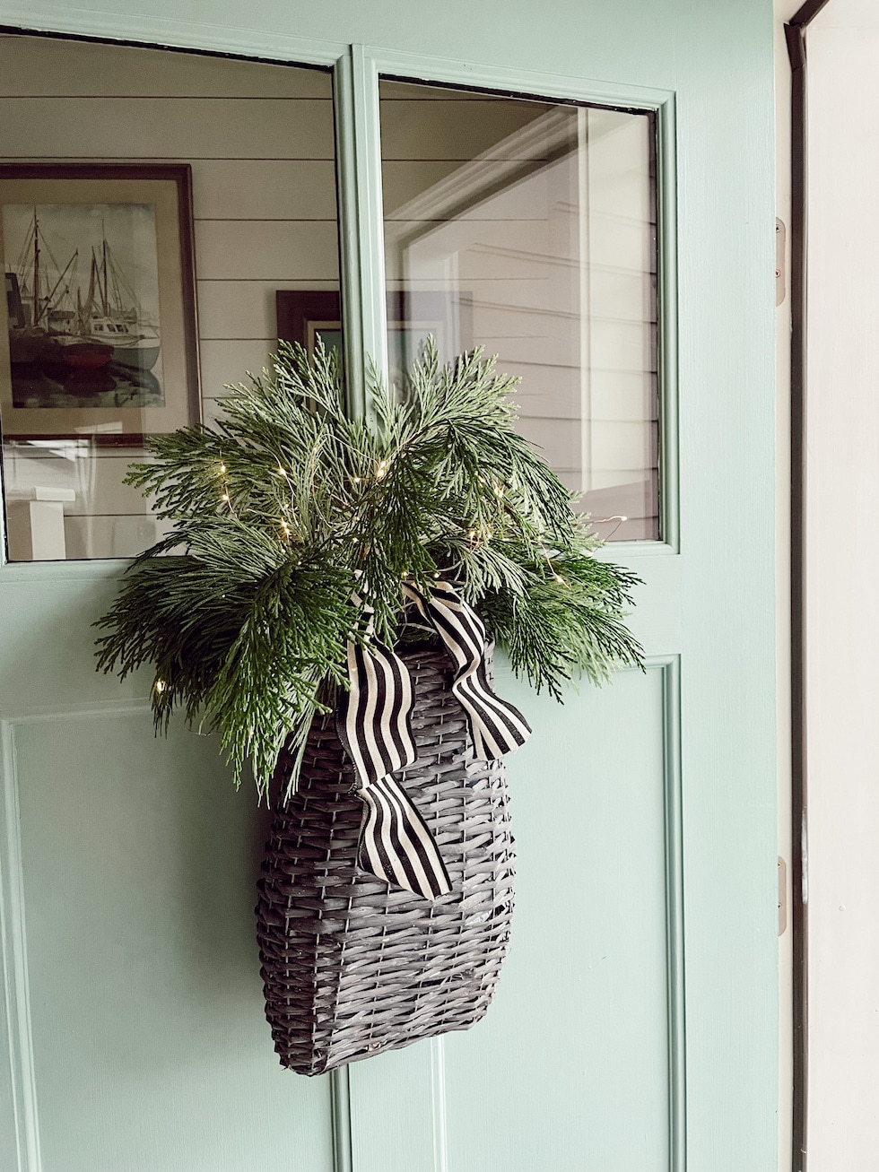 Simple Festivity: Whimsical Cedar Garland on the Staircase