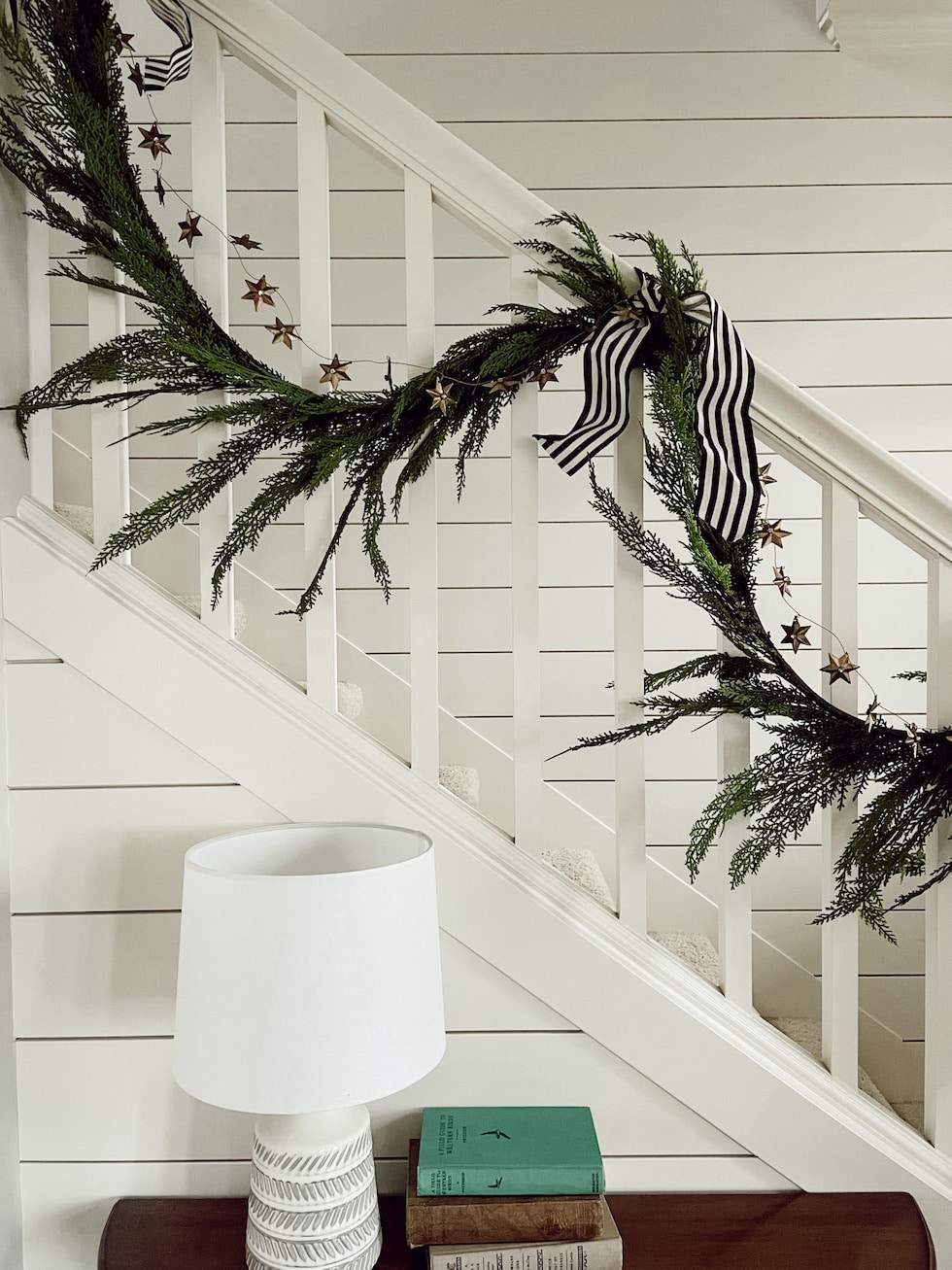 Simple Festivity: Whimsical Cedar Garland on the Staircase