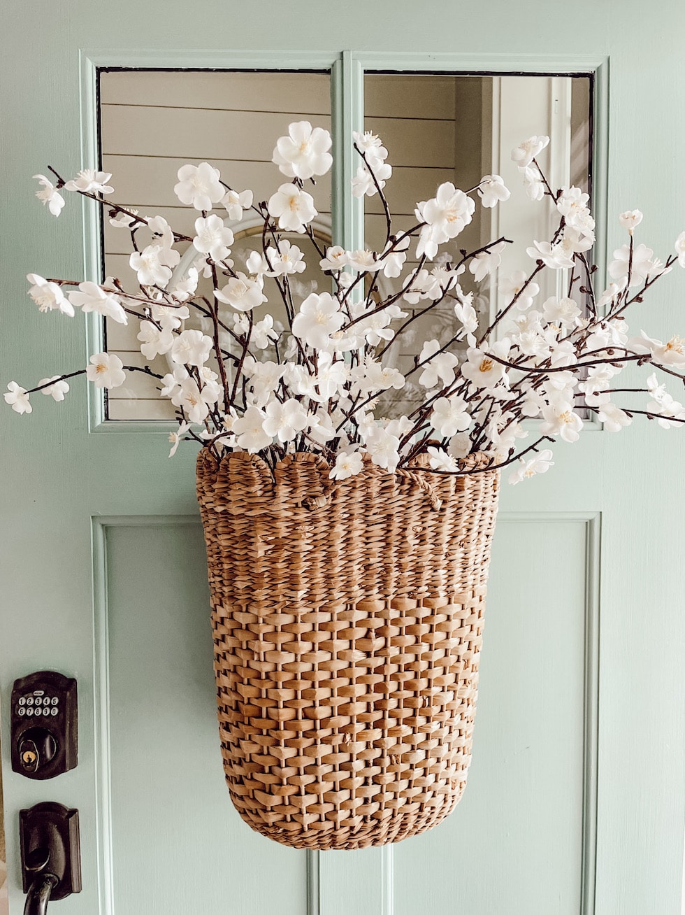 A Pretty Basket of Spring Branches to Decorate the Entry and My Front Door!