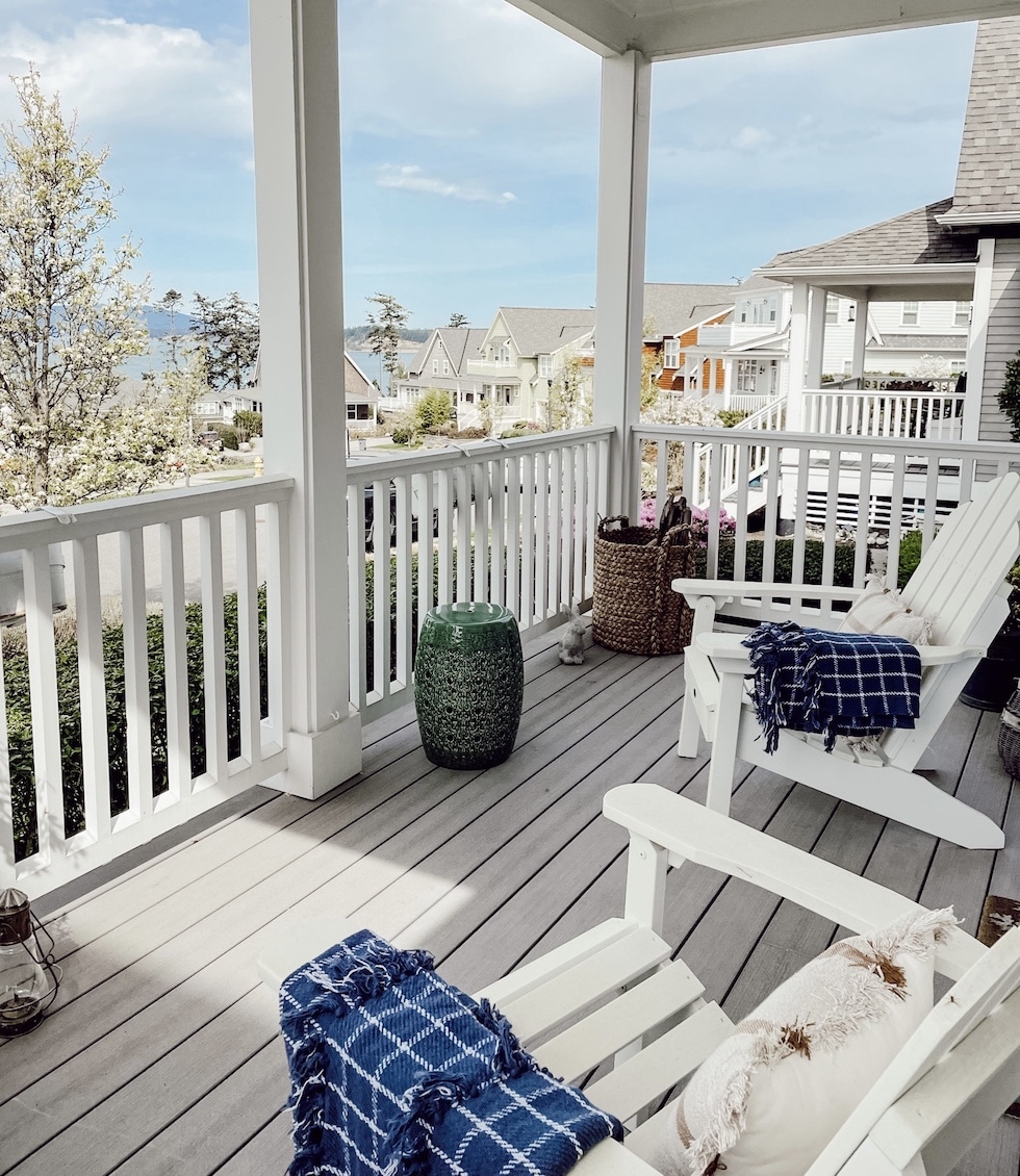 Cozy Chairs Inside of a Beach House with Open Doors Leading To