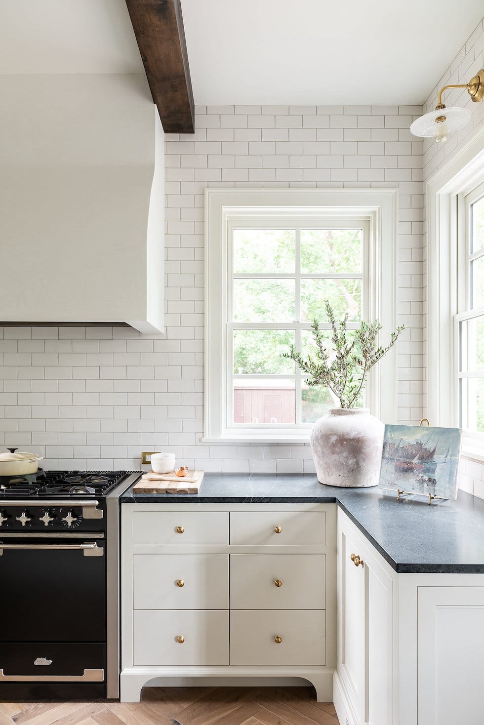 The Beauty Of Soapstone Counters Why We Chose Them For Our Kitchen   Soapstone Kitchen Countertops Subway Tile Brass Hardware Black Range 