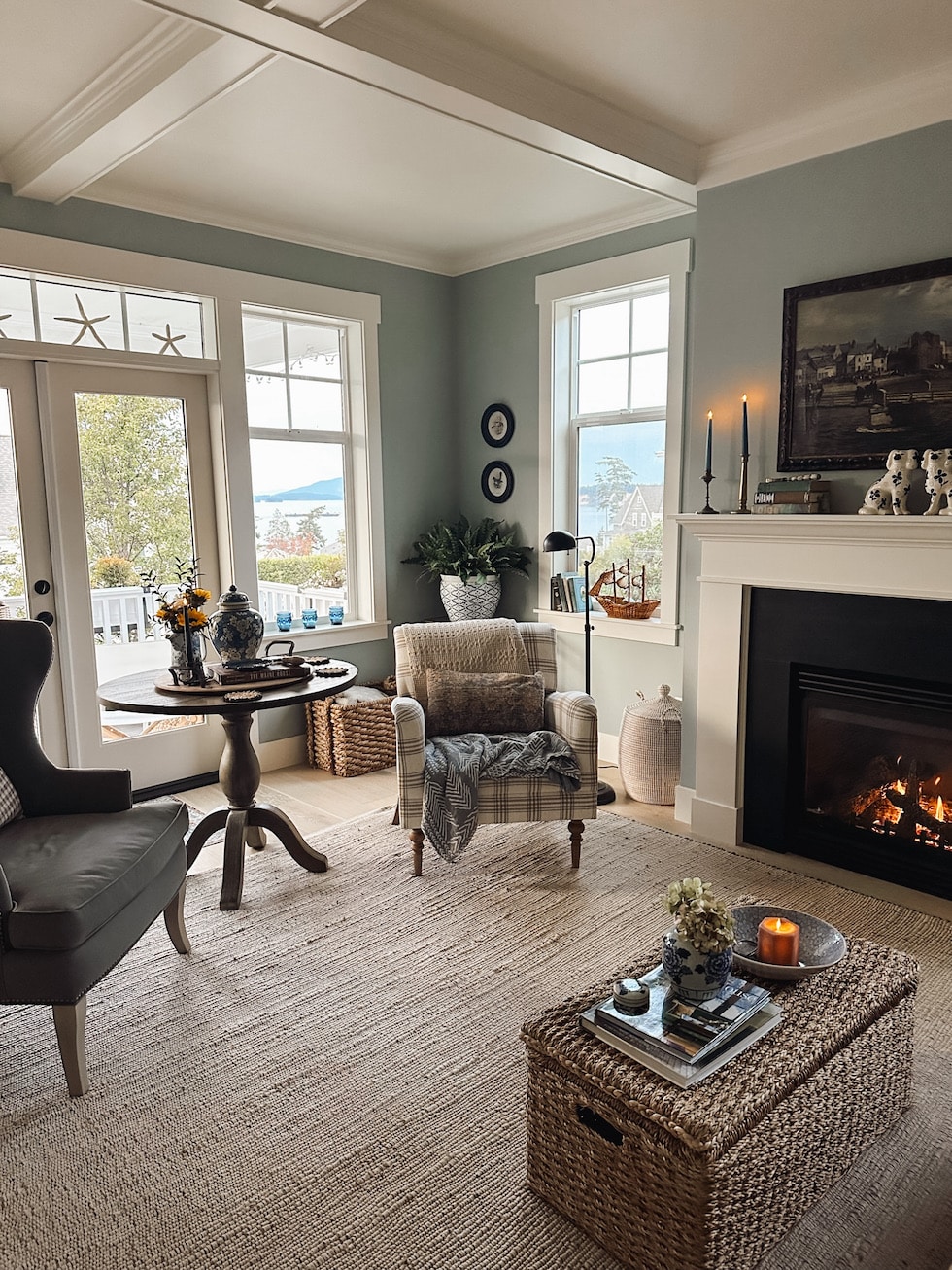 https://theinspiredroom.net/wp-content/uploads/2023/10/cozy-living-room-fireplace-coastal-cottage-the-inspired-room.jpg