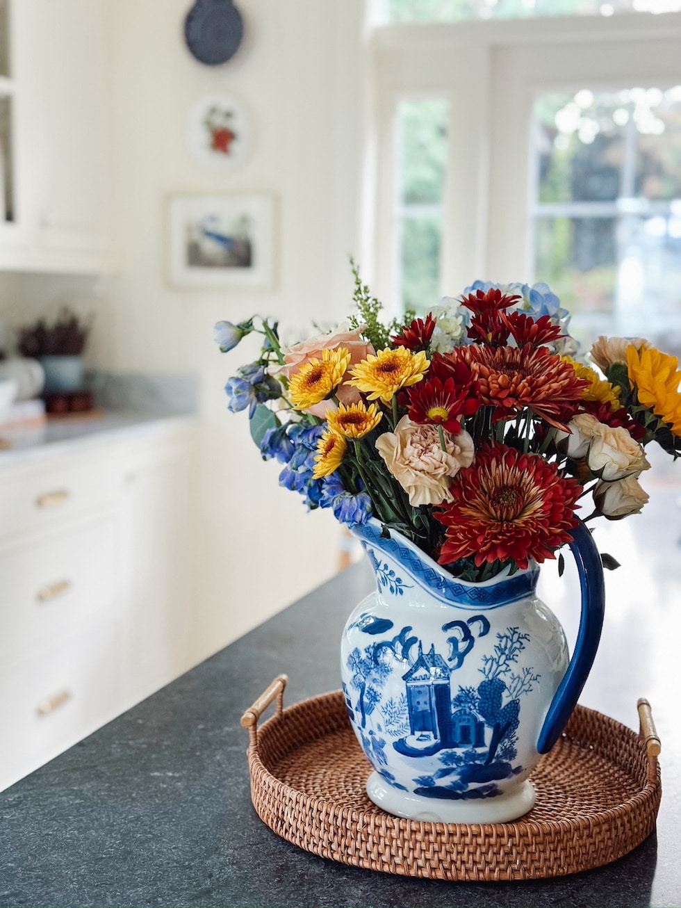 https://theinspiredroom.net/wp-content/uploads/2023/11/bouquet-blue-white-pitcher-the-inspired-room-kitchen.jpg