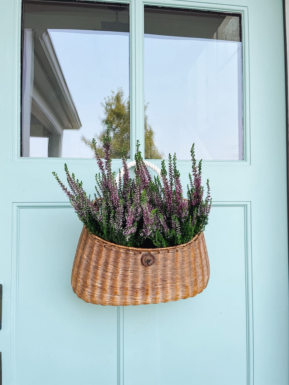 fishing basket hung on door lavender curb appeal the inspired room