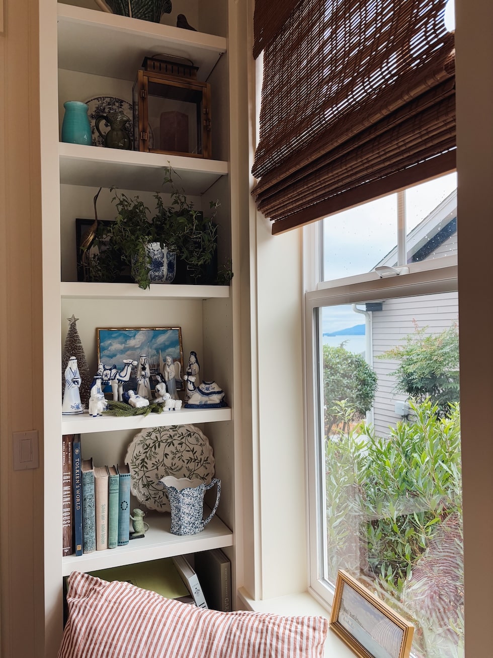 blue white nativity scene coastal cottage christmas built in bookshelves styling the inspired room