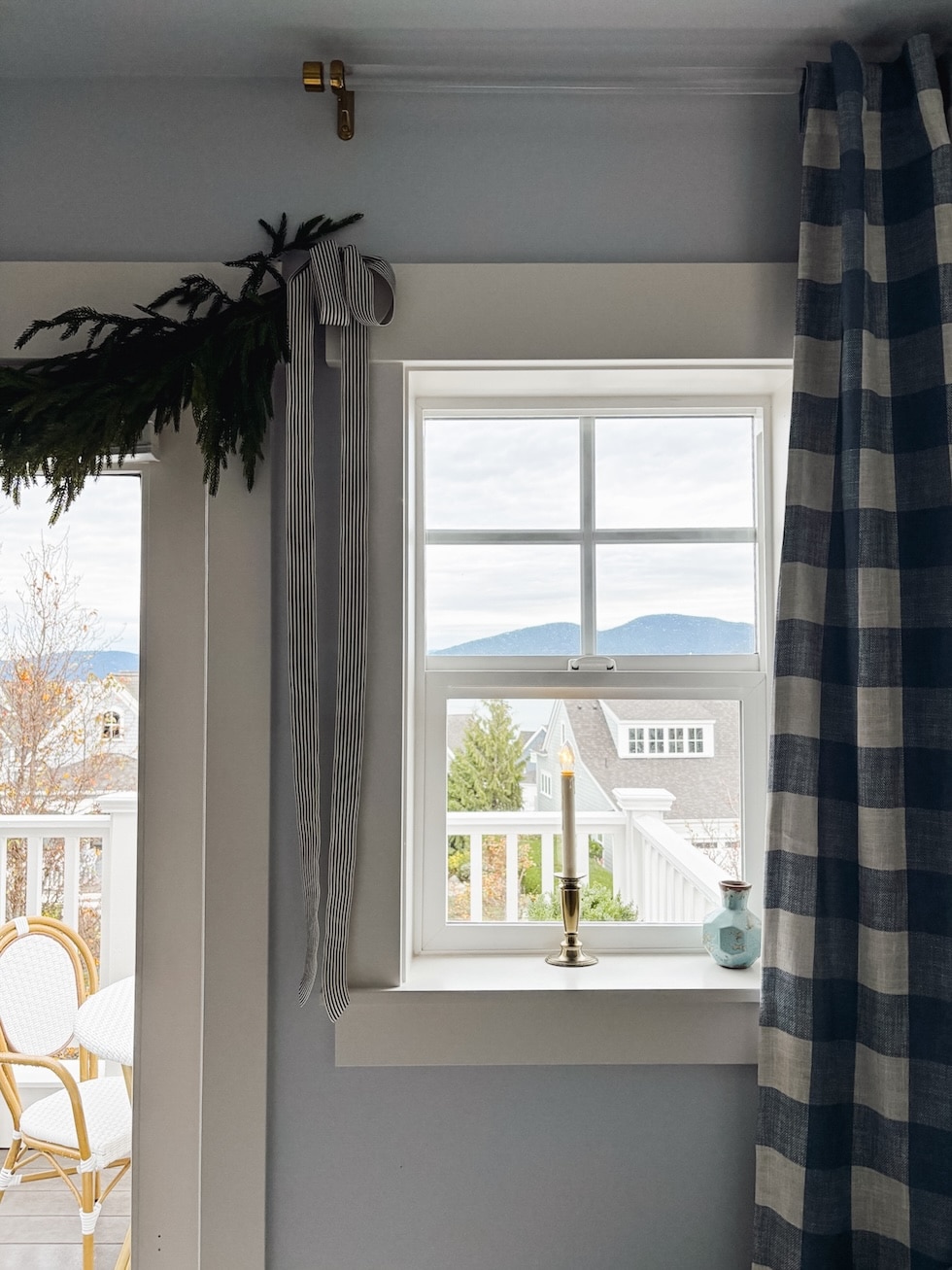 coastal cottage bedroom window candle buffalo check curtains blue white christmas garland the inspired room