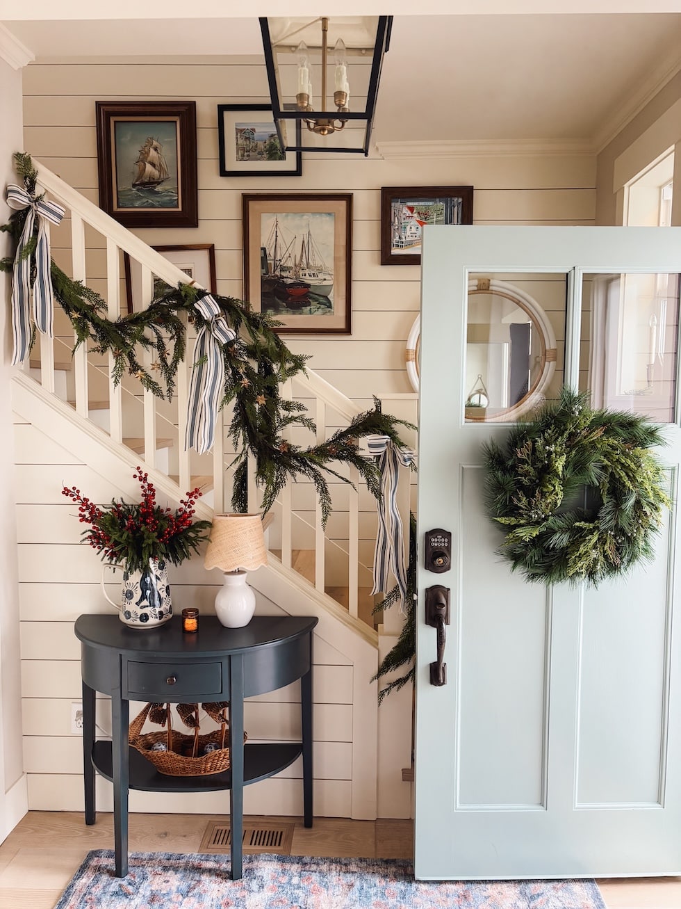 coastal cottage entry staircase garland wythe blue christmas the inspired room