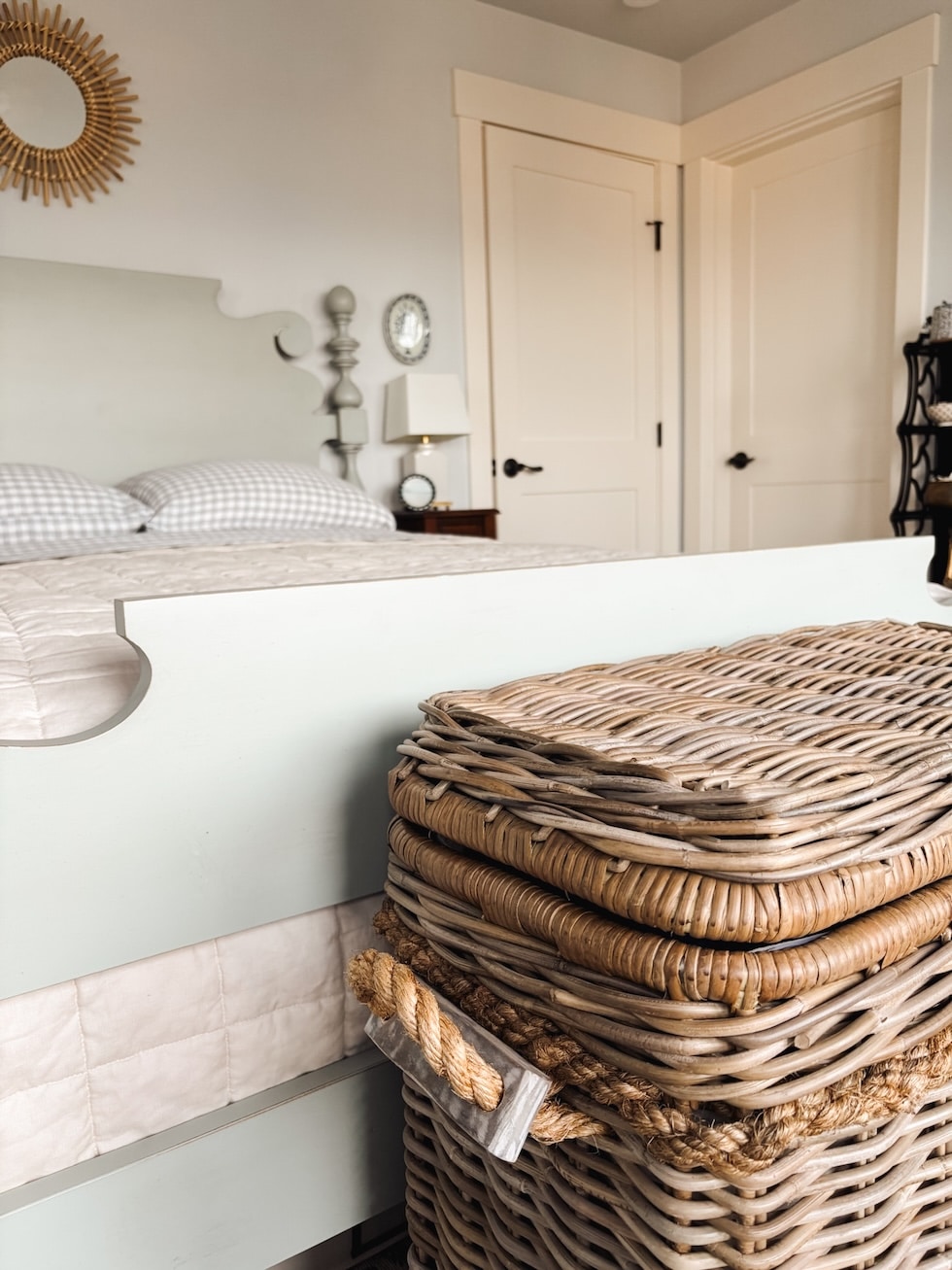 organizing with baskets a basket for blankets in bedroom