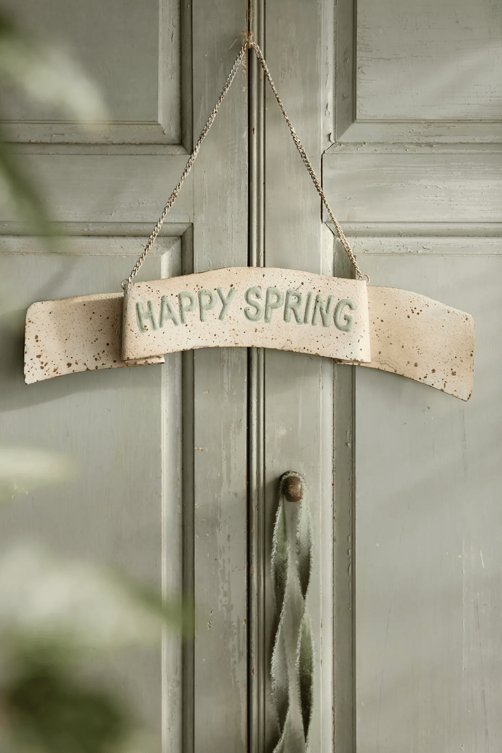 happy spring metal sign door terrain