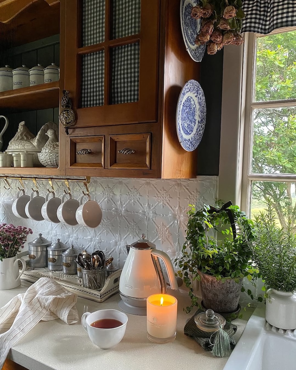 cozy cottage kitchen mug hooks plates on cabinets