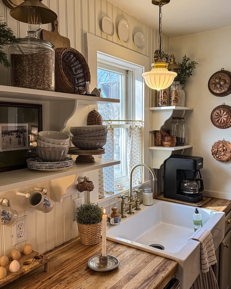 cozy cottage kitchen open shelves farmhouse sink